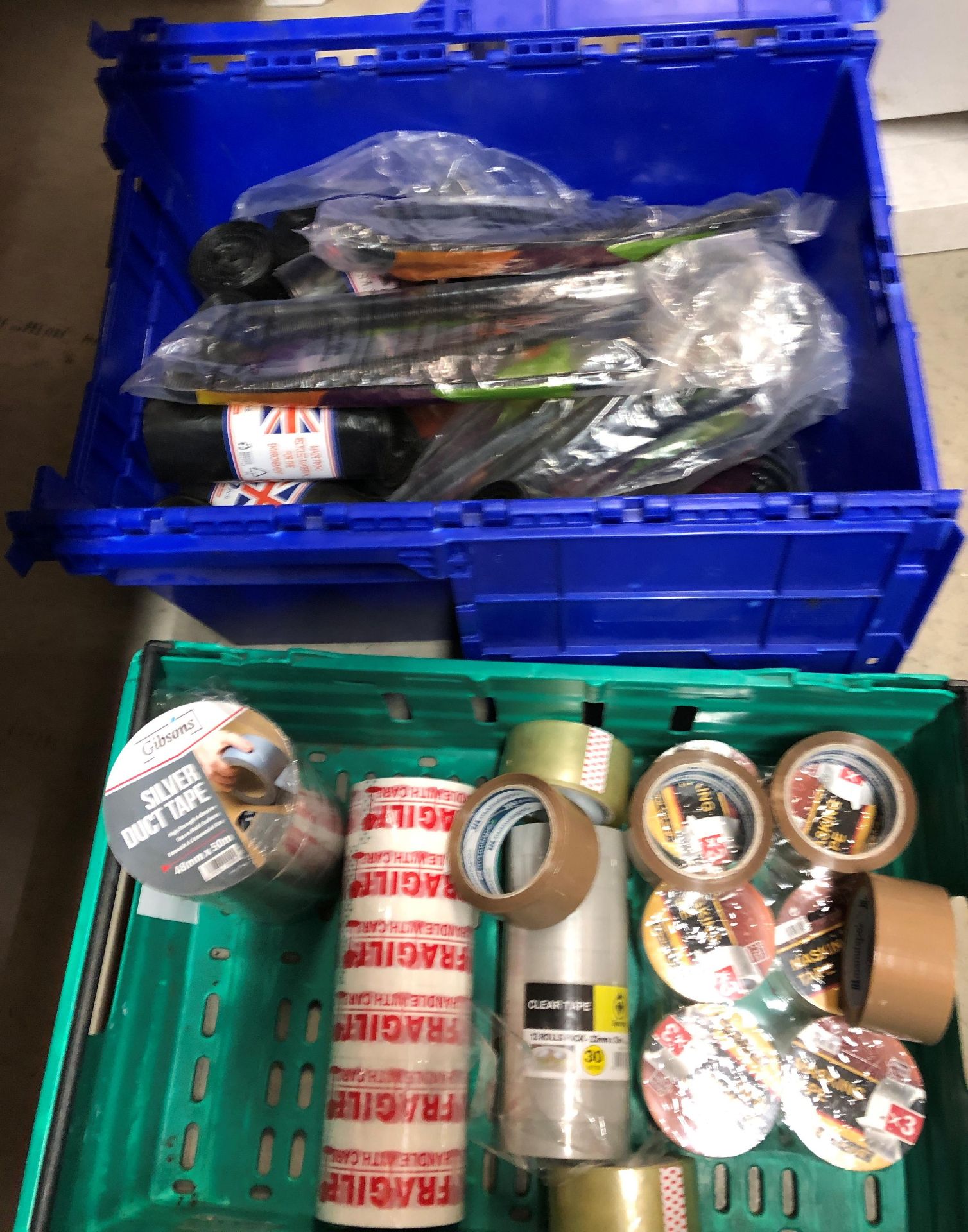 Contents to two crates including duct tape, masking tape, clear tape, rolls of black bin bags,