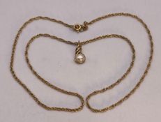 A 9ct gold 17"chain with a 9ct gold pearl pendant,
