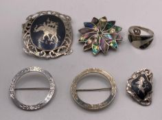 A pair of Sterling Silver circular brooches, a Sterling Indian brooch,