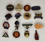 Sixteen assorted vintage enamel pin badges including 'On War Service 1915' by Thomas Fattorini