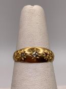 A 18ct gold diamond wedding ring (missing one stone and broken band), approximate weight: 2.