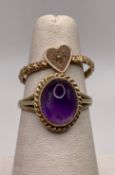 A 9ct gold 375 signet ring with purple oval stone, size L,