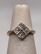 A 18ct gold and platinum Art Deco style diamond ring, size I+, approximate weight: 2.