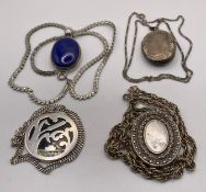 Three silver hallmark chains and pendants including two large oval lockets approximate weight 2.