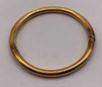 9ct gold 375 bangle 3¼ diameter, hallmark worn, approximate weight 16.