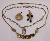 Four gold-tone items including a vintage "Floralia" leaf style link necklace,