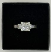18ct white gold diamond dress ring, with four princess cut stones (assessed 0.