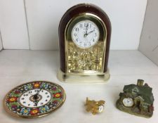 Four battery clocks - Rhythm wood and gilt effect domed clock 27cm high,