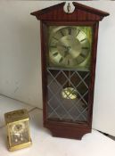 Two battery clocks - Emperor quartz mahogany-cased part-leaded glass front pendulum wall clock 57cm