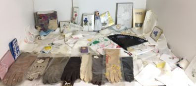 One hundred and thirty items - ladies handkerchiefs, eight pairs of ladies gloves,