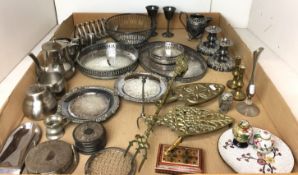Thirty plus metal items - two brass stands for irons, stainless steel tea set, cruet and toast rack,