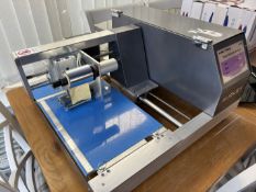 Tabletop Audley gold foiling machine.