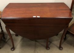 A mahogany gate leg oval drop tea table, 107cm x 49cm x 135cm,