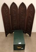 A vintage oak hand carved four panel fire screen and a vintage Criterion green metal single drawer