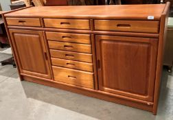 A Dyrlund Denmark mid 20th century teak sideboard with eight drawers and two doors 160cm x 48cm x