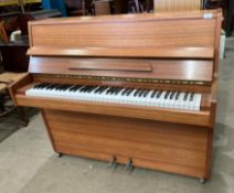 A Barkers upright iron framed piano with a Kastner-Wehlau floating centre action,