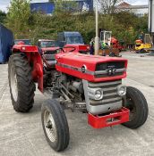A VINTAGE MASSEY FERGUSON 135 AGRICULTURAL TRACTOR - Diesel - Red/Grey. Registration No: NBE 628F.