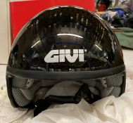A Givi TG.60 motorcycle helmet, black, size L, no visor, unused