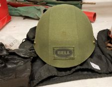 A Bell Dot Drifter motorcycle helmet in green, no size shown, marked but unused, incomplete,