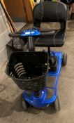 A blue four wheel mobility scooter with key and charger - runner (CWH Ref: PO)
