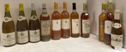 A collection of eleven vintage white wines (sold as seen, advised stored in a cellar),