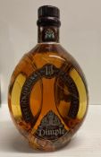 A 70cl bottle of The Original Dimple 15 Year Old Fine Old Original De Luxe Scotch Whisky 40% volume