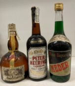 A bottle of Grand Marnier Liquor, a bottle of Peter Heering Liqueur and a 26fl.