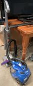 A Hoover H-Free C300 cordless vacuum cleaner and 4 Bissell Easyvac compact vacuum cleaner (2) (CWH