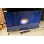 A TCL 32SF-560UK 32" TV (one leg broken) with remote control (CWH Ref: PO)