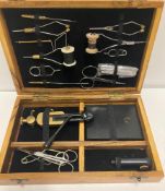 A De-Luxe brass and steel 'Fly' tying kit complete with fly-tying vice, bobblins,