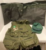 A Wychwood carp sack and a green fabric fishing waist coat and cap with roll up netting (CWH ref: