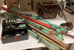 A vintage fishing box/bag and assorted floats/hooks and a Garcia Mitchell '320' and '300' reels