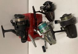 4 x Assorted fishing reels including Daiwa (DS1350), a Shakespeare '2002HK',
