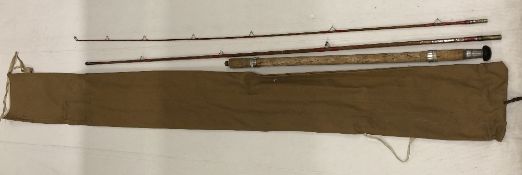 A vintage three piece split cane rod in canvas bag with worn name to rod 'Stuart Jensen' (CWH Ref: