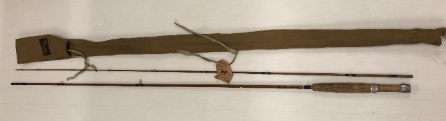 A vintage Sharpe 'Scottie The Featherweight' #8 5' 6" two piece split cane fly fishing rod in