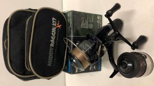 A Shimano 'Baitrunner' DL10000RA fishing reel with box and two spools in a Middy fabric bag (P08)