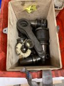 Contents to three plastic boxes, a quantity of CNC taper tool holders, spindle coupling sleeves,