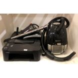 3 x items - an Amazon basics cylinder vacuum cleaner,