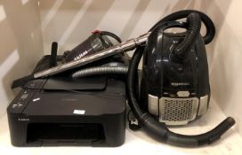 3 Items, a Amazon basics cylinder vacuum cleaner,