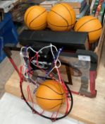 Basketball net with four small plastic basket balls,