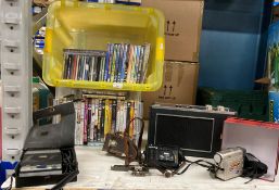 Contents to part of shelf - an HMV portable radio, a Philips vintage tape recorder,