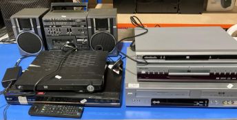 Six items, a Daewoo DVD recorder and VCR model DF-4500P, a Pacific DVD player,