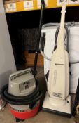 An Aqua Vac MultiSystem 22 wet & dry vacuum and a Panasonic MC-E450 upright vacuum cleaner,