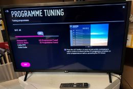2 items - an LG 32" Smart TV model 32LM637BPLA complete with remote and a Sharp Video Plus VHS