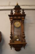 Oak & Mahogany Cased Vienna Wall Clock with Decorative Brass Face and Pendulum