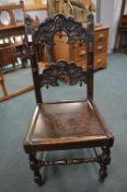 Victorian Fumed Oak Carved Chair with Folk Art Designs