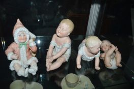 4x Continental Bisque Piano Babies Including Father Christmas