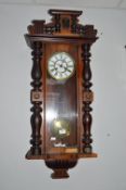 Mahogany Cased Vienna Wall Clock with Brass & Enamel Face, Turned & Carved Detail