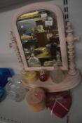 Pink Vanity Mirror with Assorted Trinket Boxes and Perfume Bottles