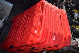 *Row of Red Plastic Barriers